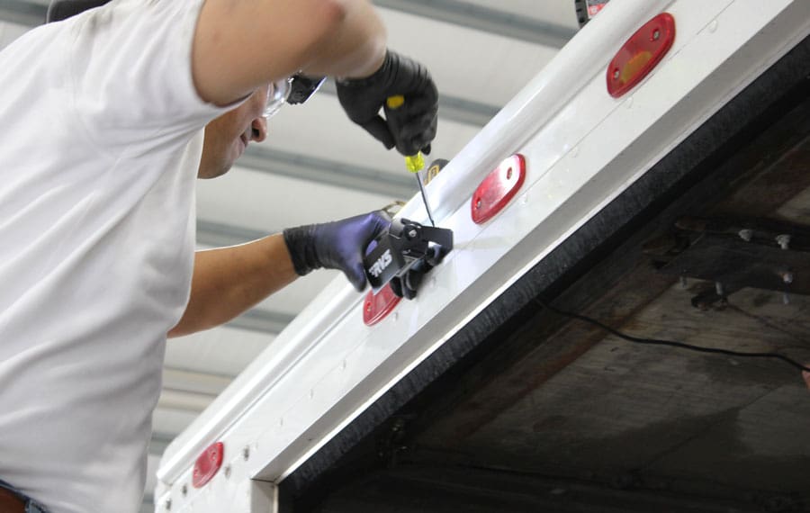 AMFS installing RVS equipment on Truck